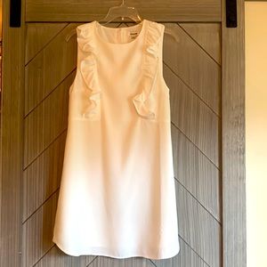 New with tags ivory colored ruffle dress size small.